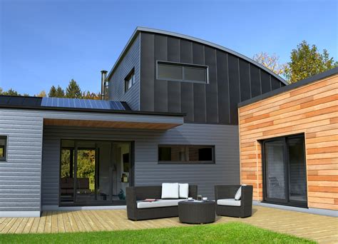 Façade de maison avec bardage bois gris clair