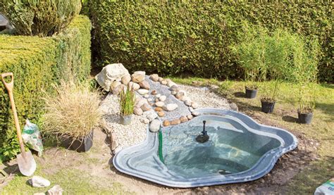 Schéma d'installation d'un bassin préformé avec lit de sable