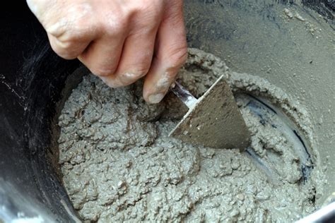 Sable et ciment pour la préparation du mortier