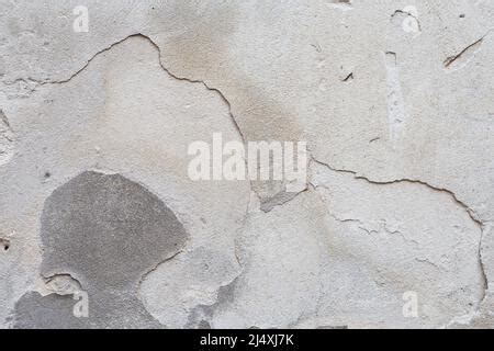 Murs en plâtre fissurés