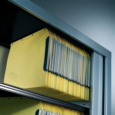 Illustration d'un système de classement par dossiers suspendus dans une armoire