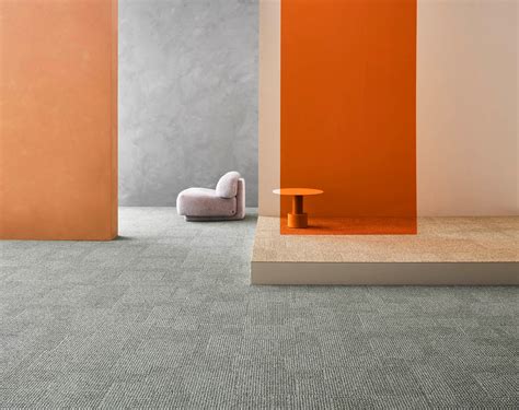 Gros plan sur la texture de la dalle moquette Desso Tweed