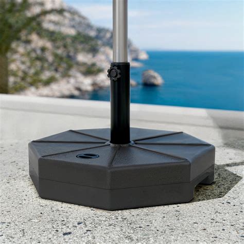 Schéma expliquant comment remplir un pied de parasol avec de l'eau ou du sable