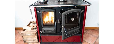 Diagramme des couches d'une cuisinière à bois avec indications des zones d'application de colle réfractaire