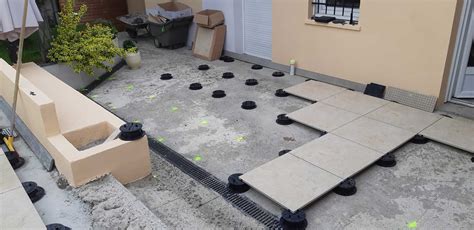 Installation de plots pour terrasse