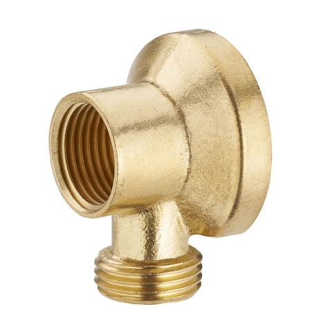 Détail d'une applique murale en laiton pour robinet de jardin