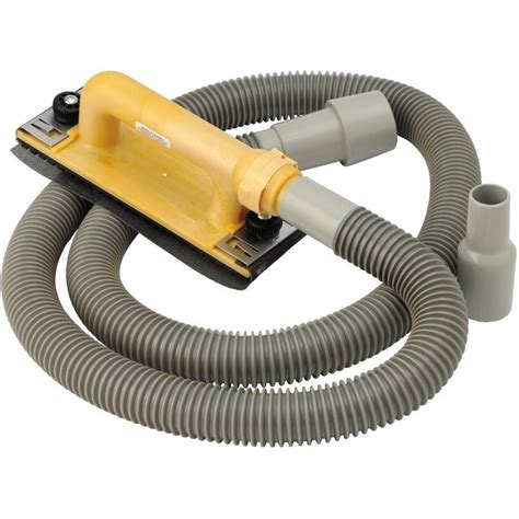 Ponceuse avec tuyau d'aspirateur connecté