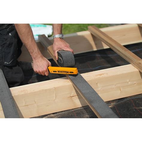 Outil de marouflage pour bande bitumineuse