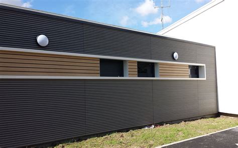 Panneaux de PVC rigide utilisés comme bardage extérieur