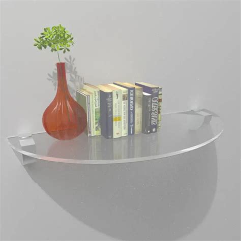 Étagère murale en plexiglas transparente avec des objets décoratifs flottant