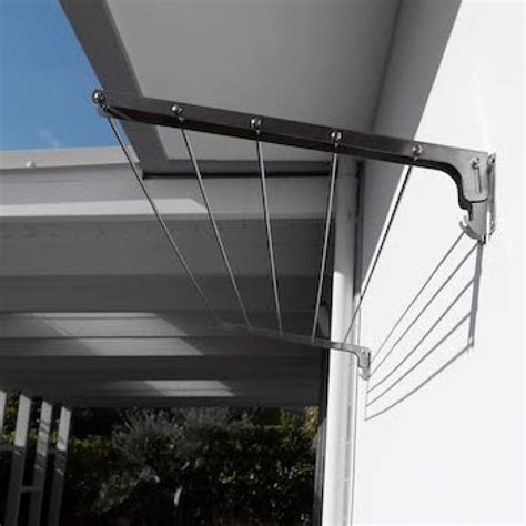 vue éclatée d'un étendoir mural inox montrant ses différents composants