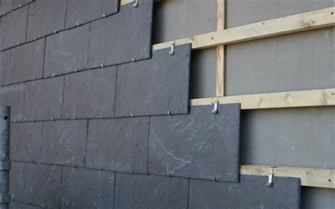 Façade de maison avec bardage en ardoise