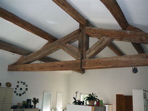 Maison avec charpente traditionnelle apparente